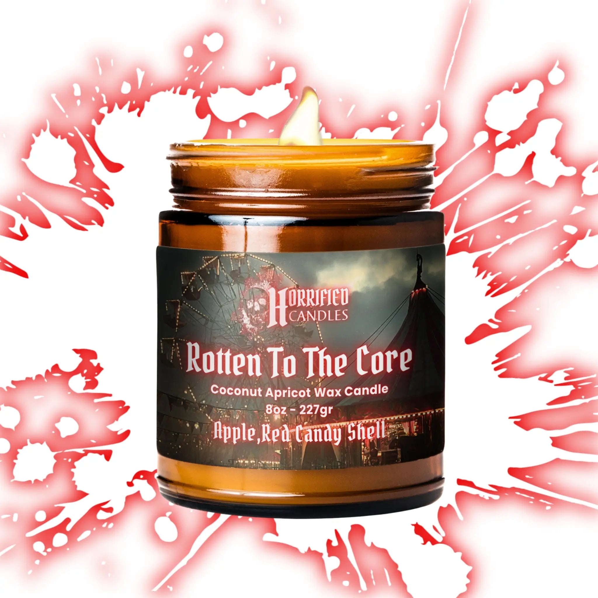 Candle in a jar labeled 'Rotten To The Core' with a spooky design on a red and white splatter background.