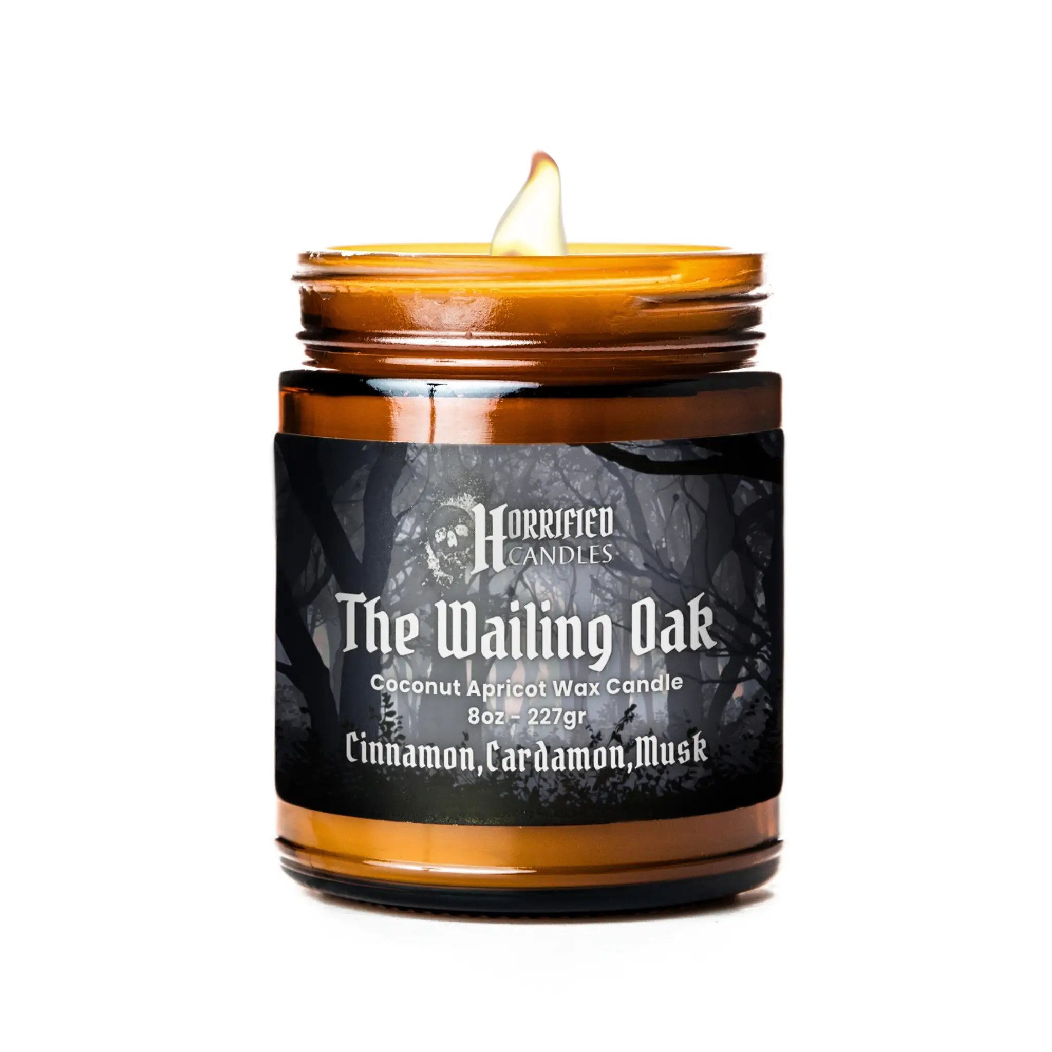 Candle in a glass jar with a black label on a white background