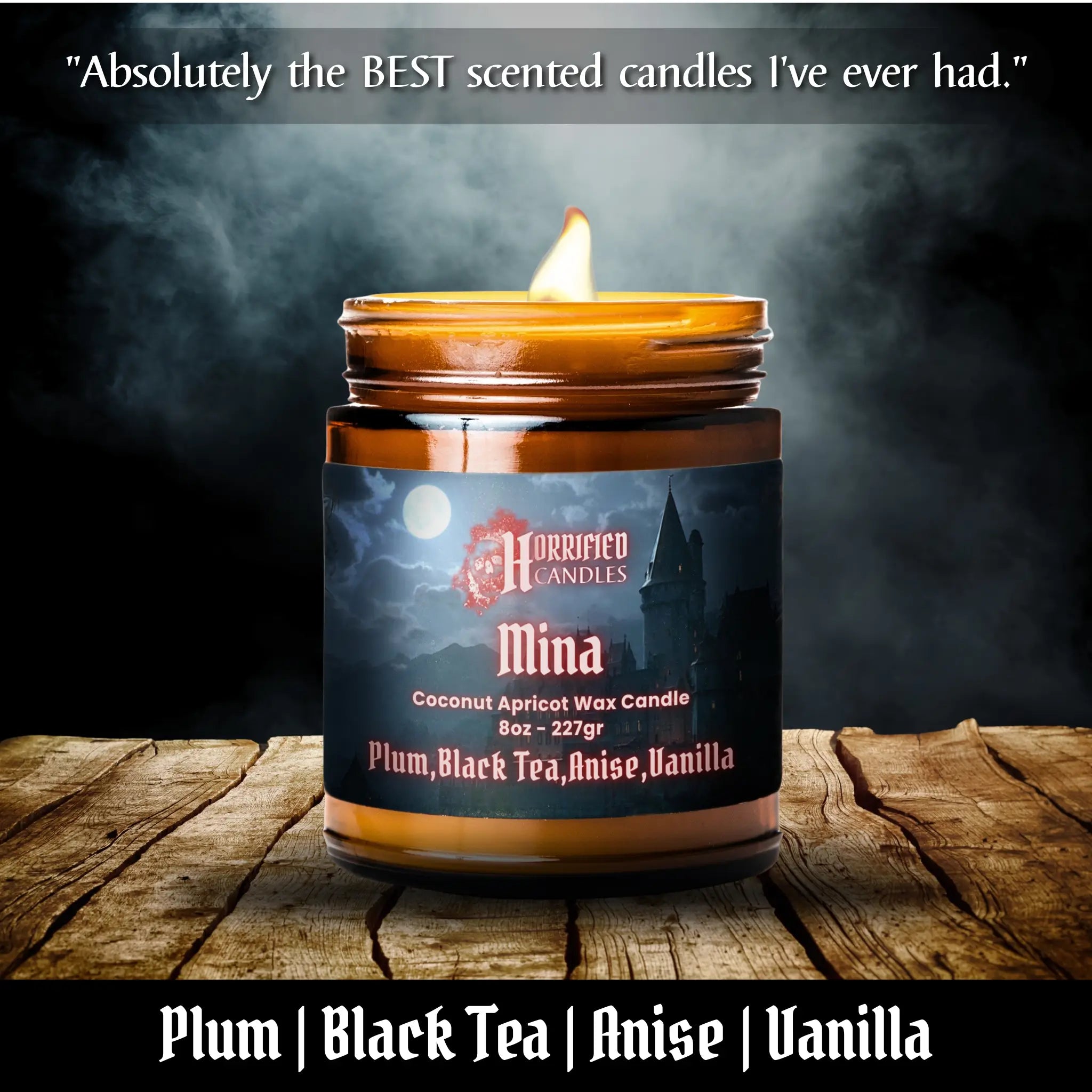 Candle with a label on a wooden surface, featuring the brand and product details.