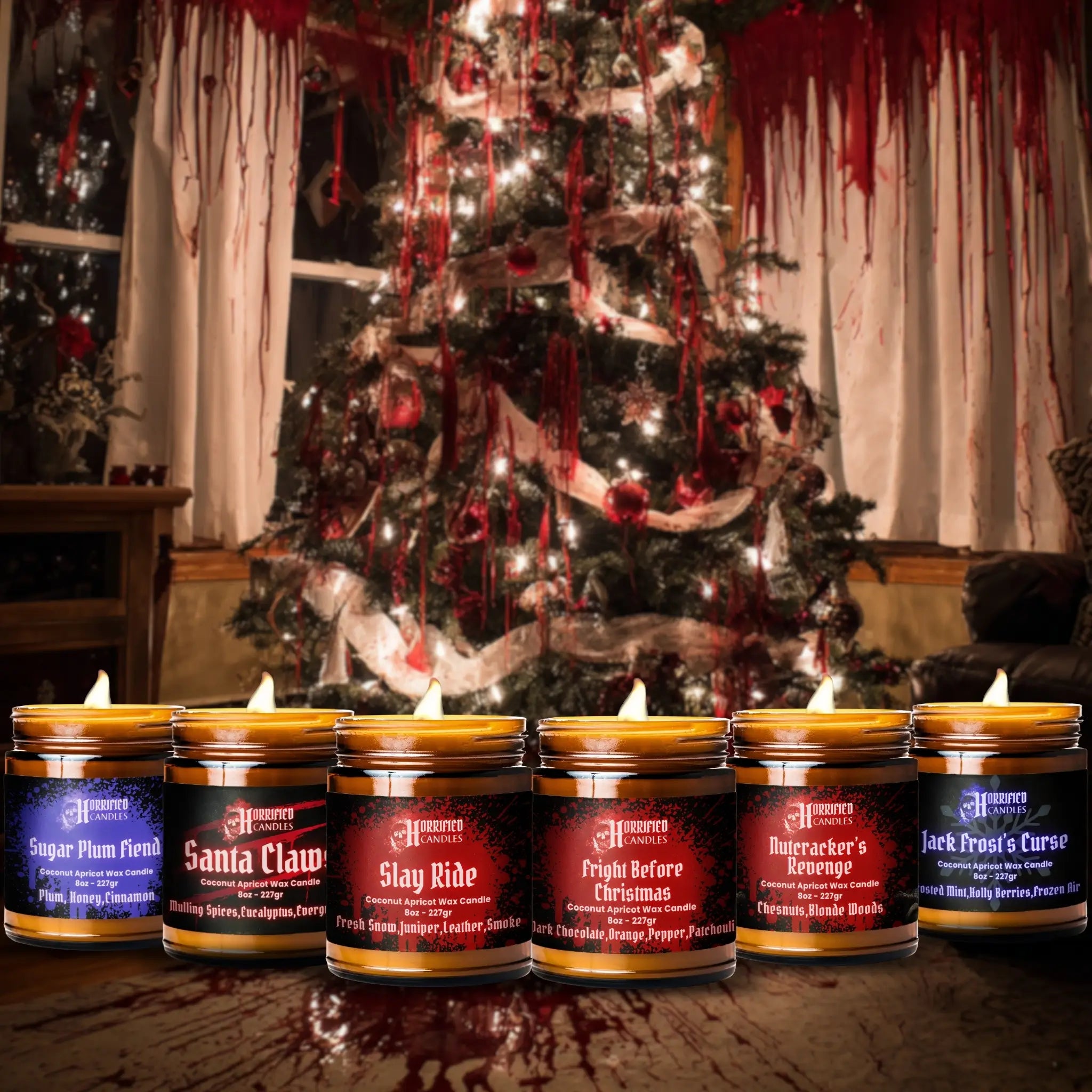 Row of candles with Halloween-themed labels in front of a decorated Christmas tree with red accents.
