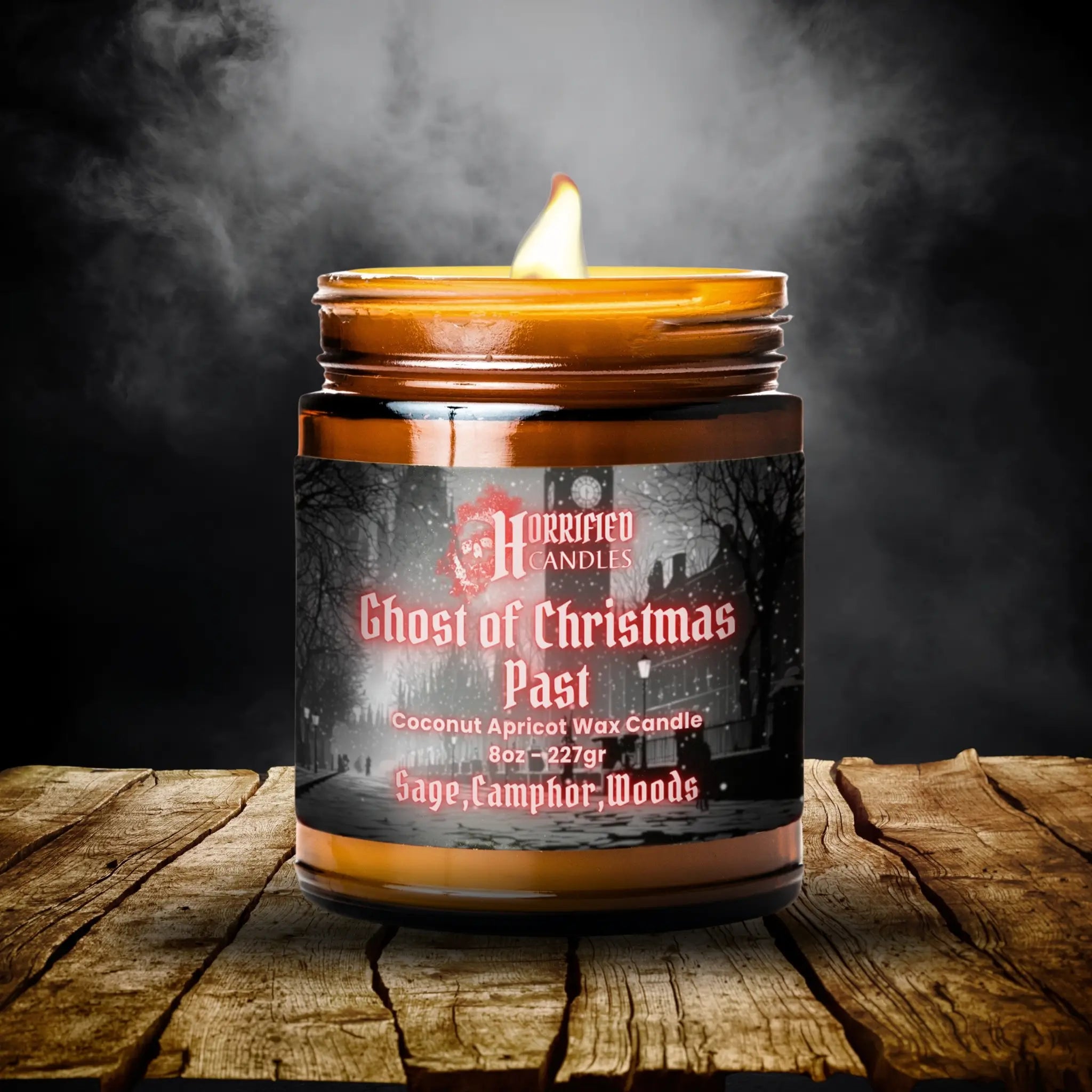 Candle labeled 'Ghost of Christmas Past' on a wooden surface with a dark background