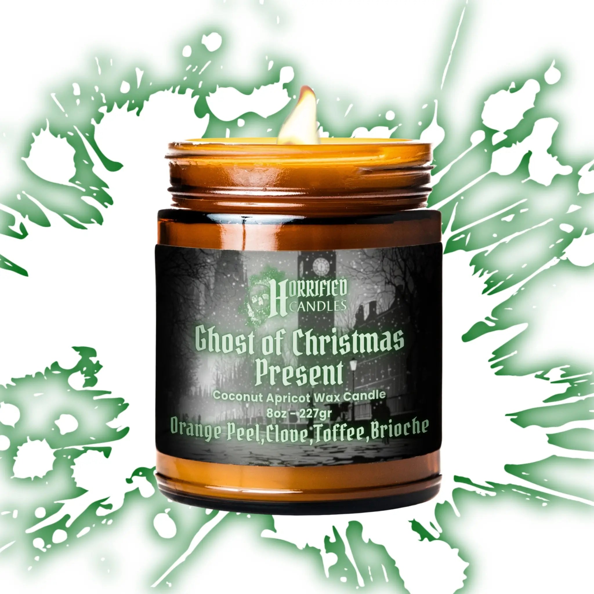 Candle in a jar labeled 'Ghost of Christmas Present' with decorative green background
