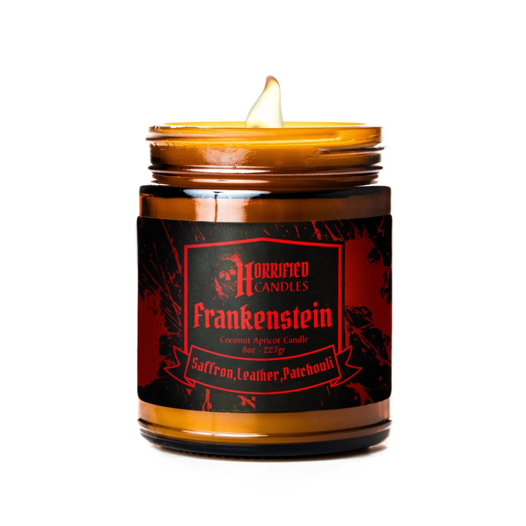 Candle in a glass jar with a 'Horribled Candles Frankenstein' label on a white background