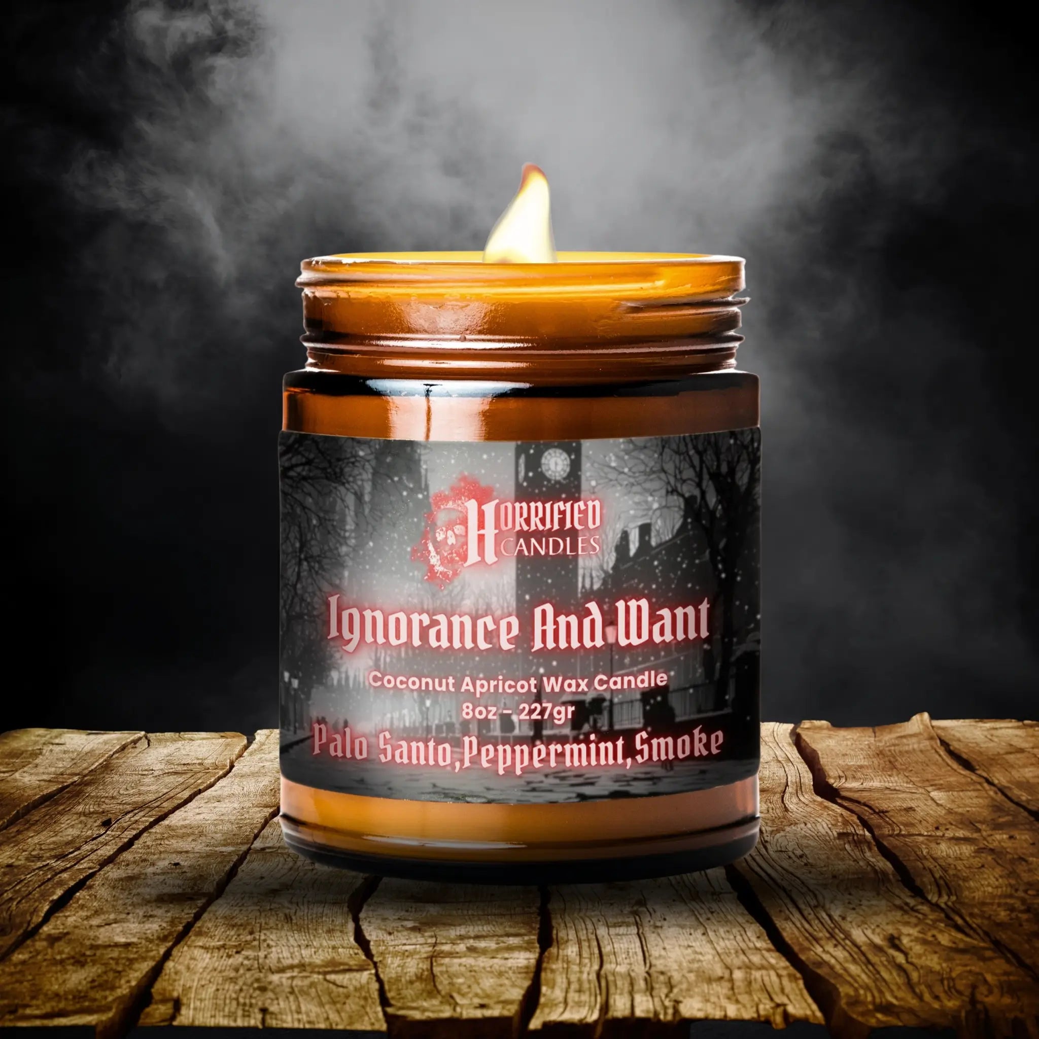 Candle in a brown jar with a label on a wooden surface and dark background