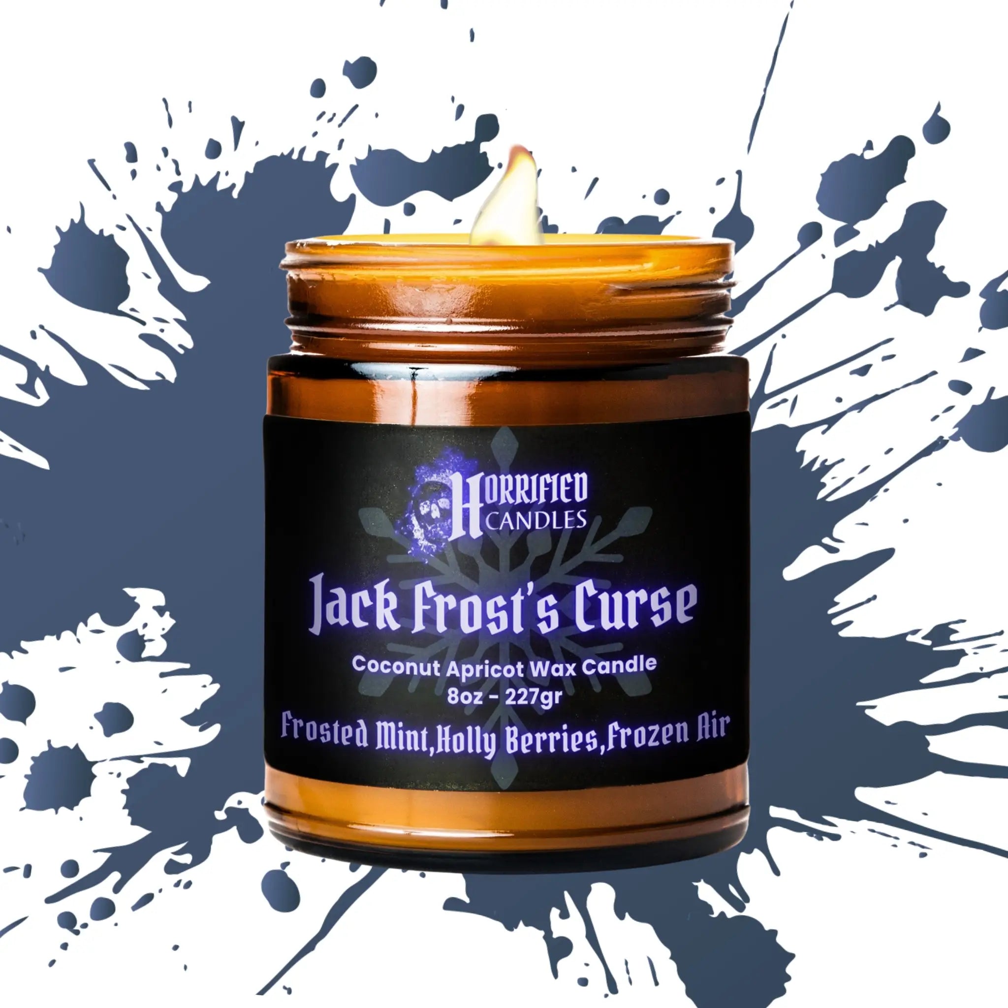 Candle jar with 'Horrified Candles' label on a blue and white abstract background