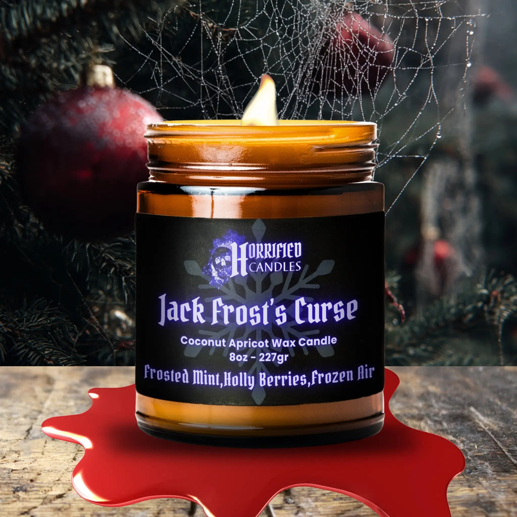 Horrified Candles Jack Frost's Curse candle with a Halloween-themed background