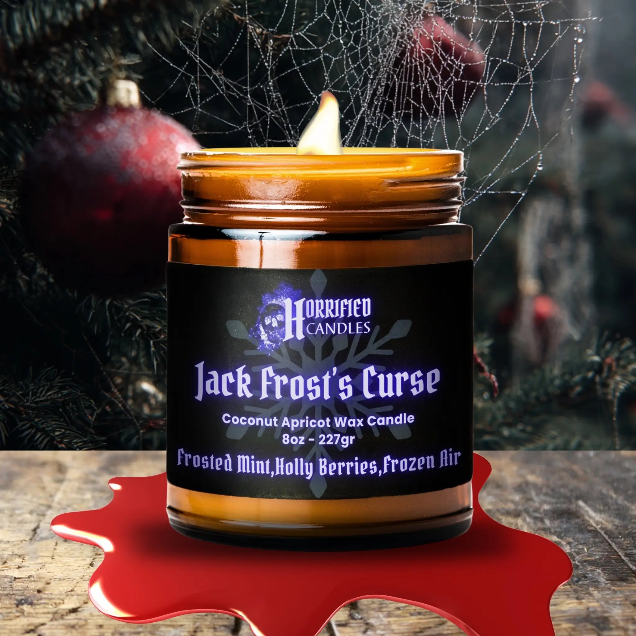 Horrified Candles Jack Frost's Curse candle with a Halloween-themed background