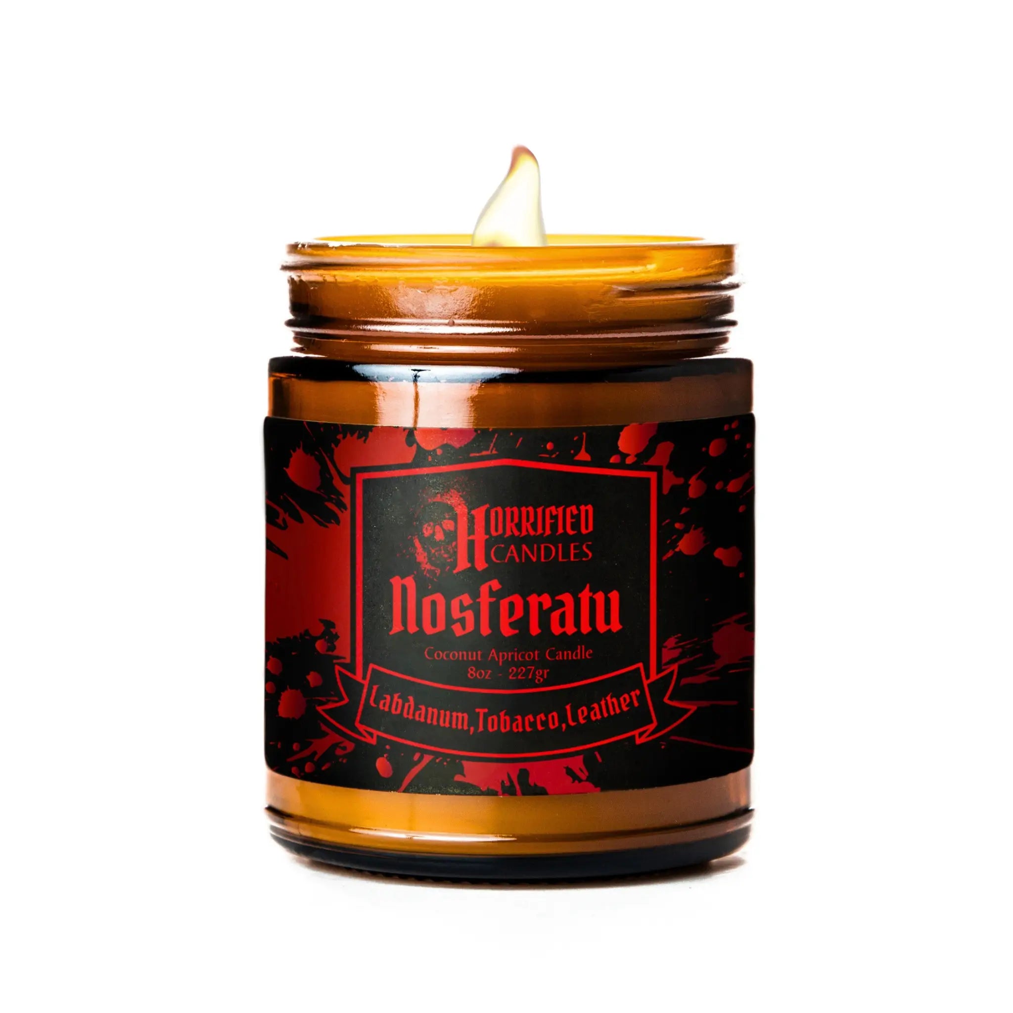 Candle in a jar with a 'Nosferatu' label on a white background