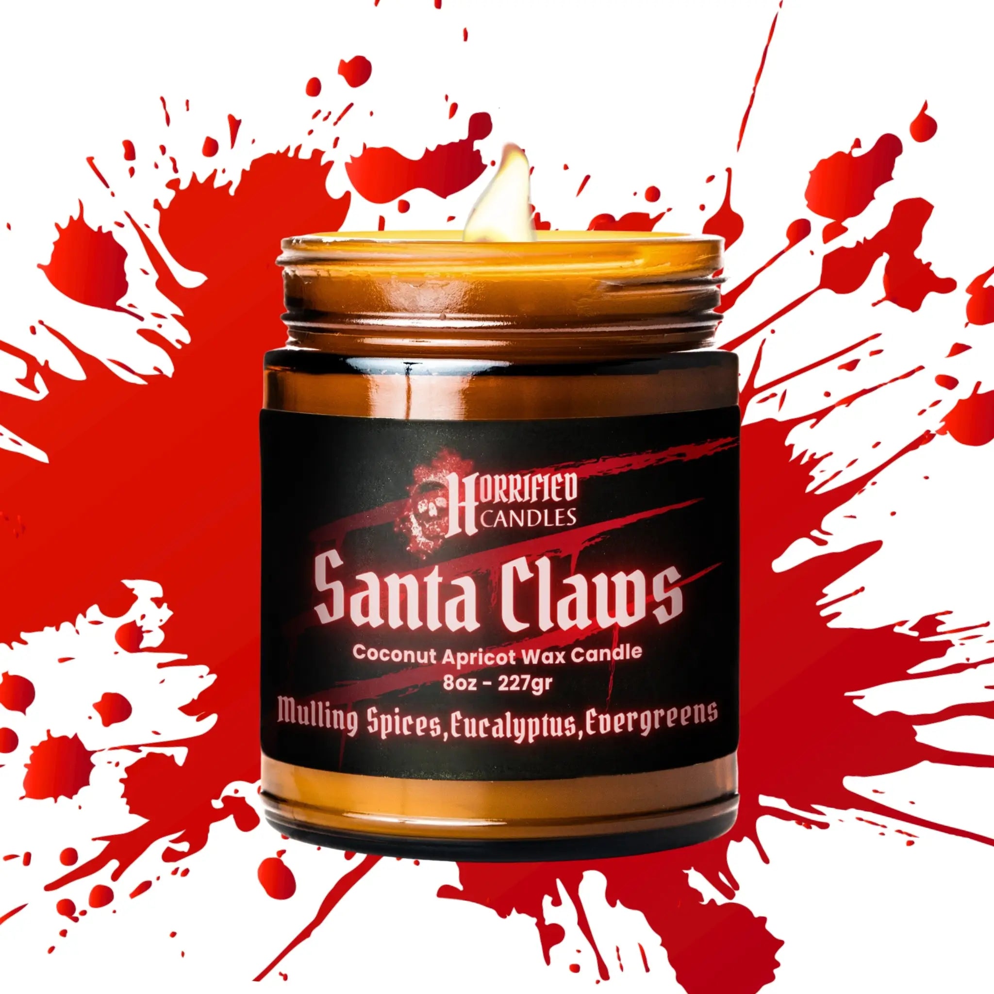 Candle jar with 'Santa Claws' label on a red and white splatter background
