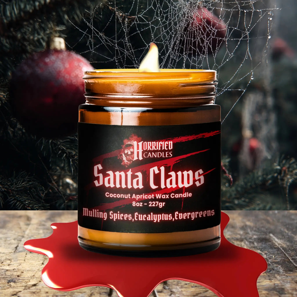 Candle labeled 'Santa Claws' with a dark background and spider web.