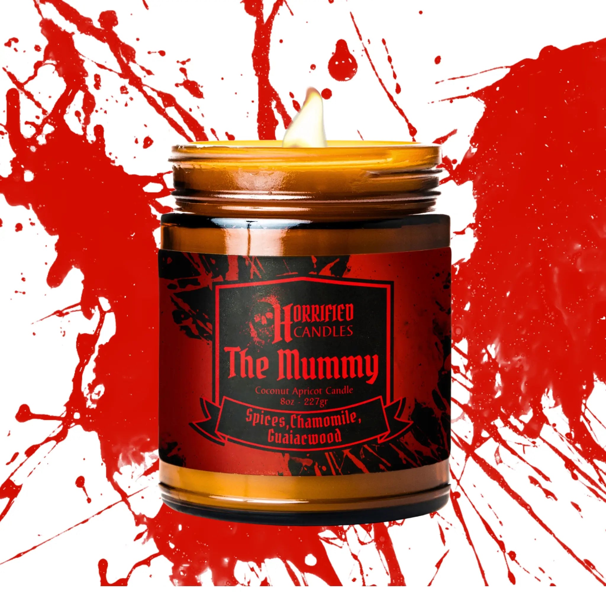 Candle labeled 'The Mummy' with a red and white splatter background