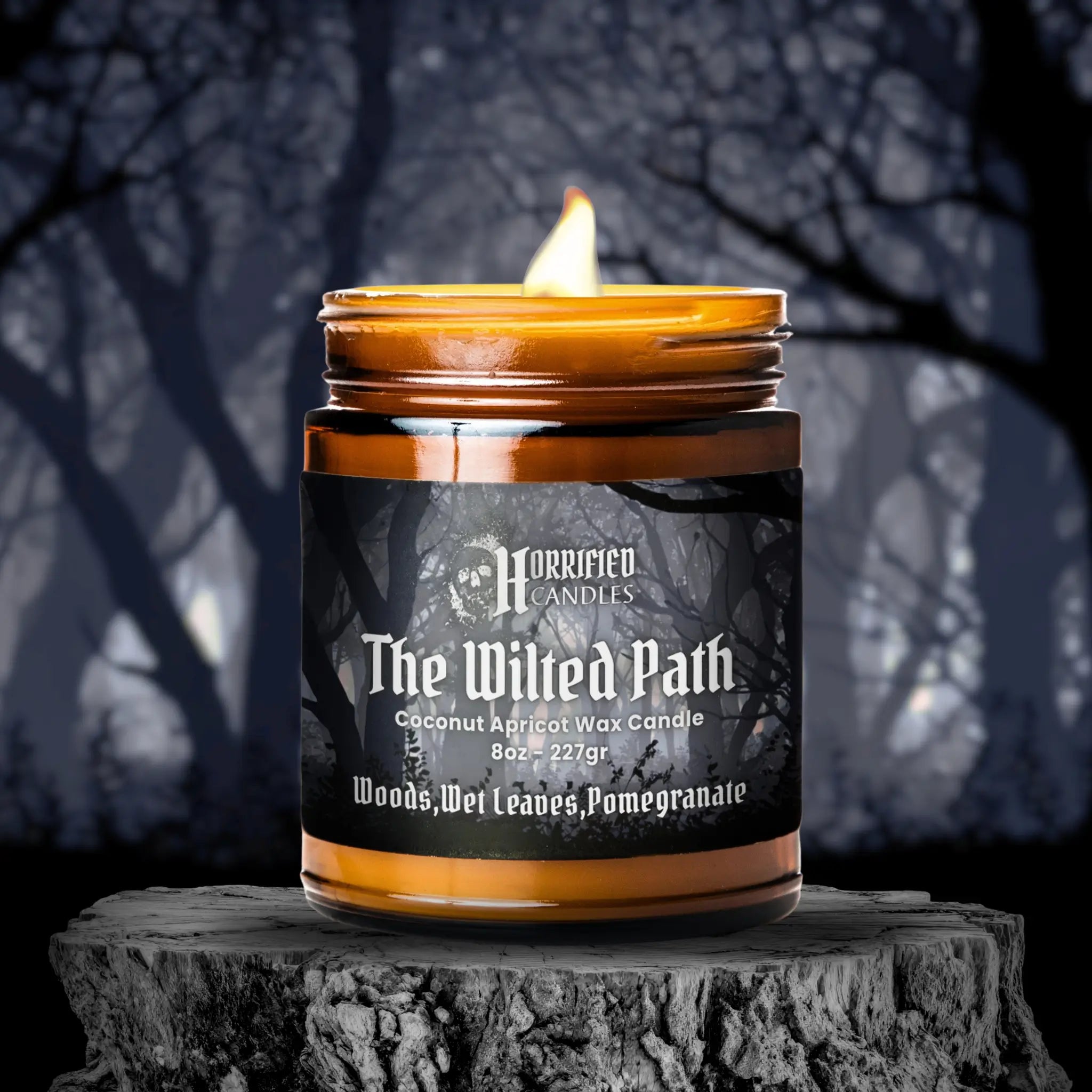 Candle labeled 'The Wilted Path' on a dark background with tree silhouettes.