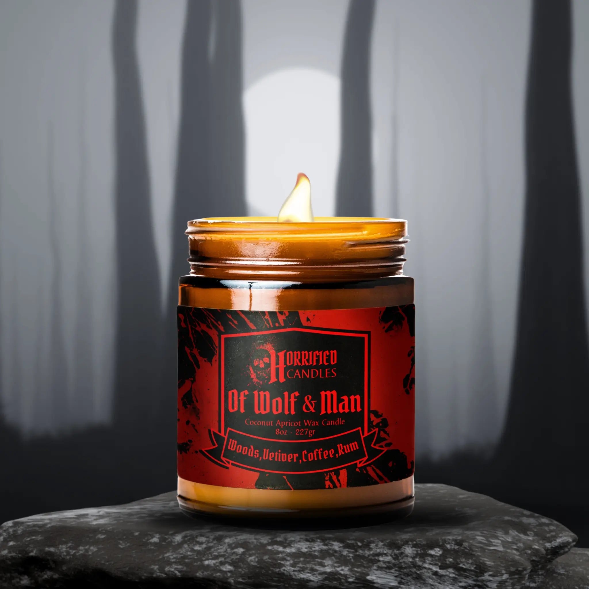 Candle in a jar with a red label on a dark background